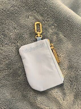 lululemon pale blue key pouch with gold hardware